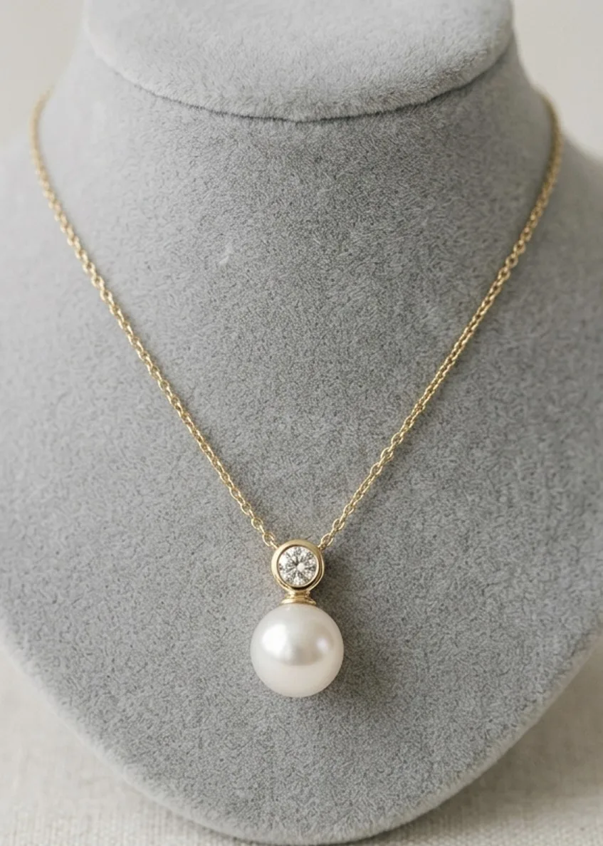 Gold necklace flat lay product photo